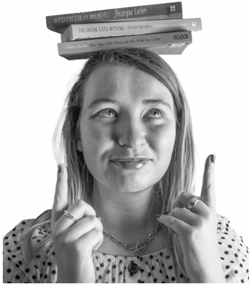 Girl balancing books on head Girl balancing books on head