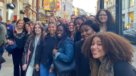 A group photo of the Creative Access team outside Get Up, Stand Up! in London's West End